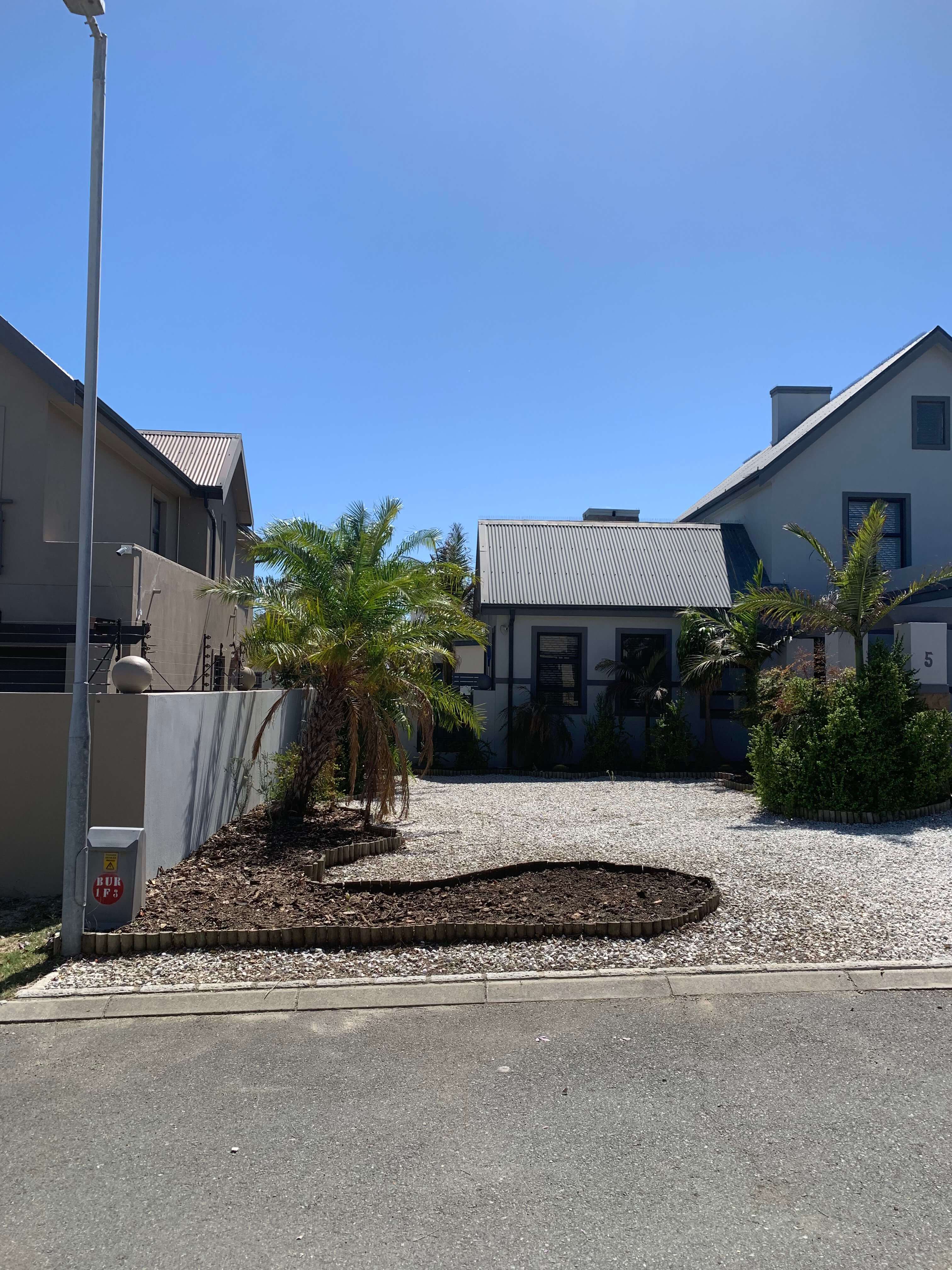 Cleaned driveway after bushes were removed